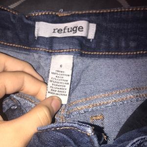 Pair of dark blue Jean ripped pants size 6 in womens